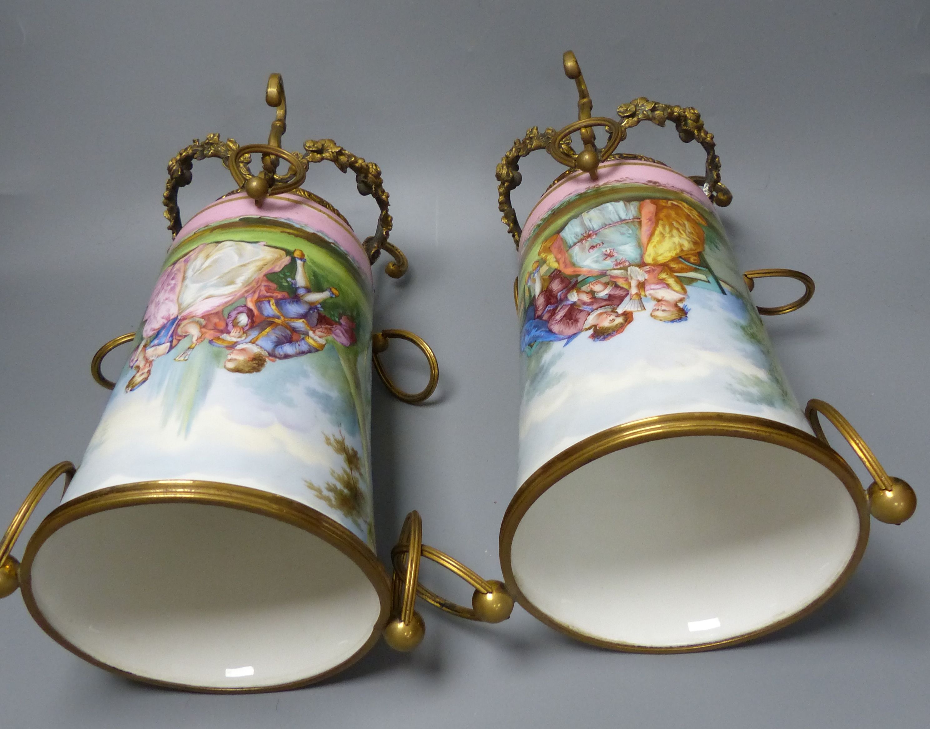 A pair of late 19th century Paris porcelain and gilt metal mounted vases, height 33cm